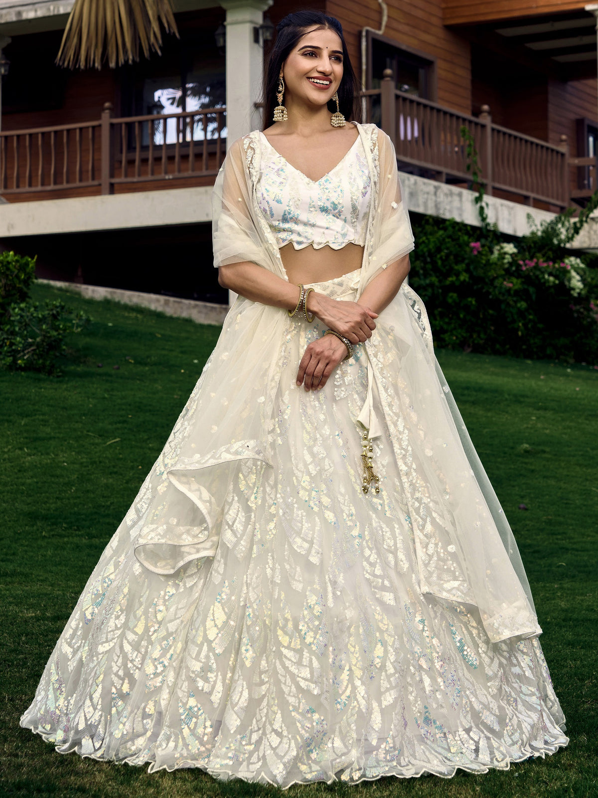 White breezy lehenga crafted with thread embroidery work - Joshindia