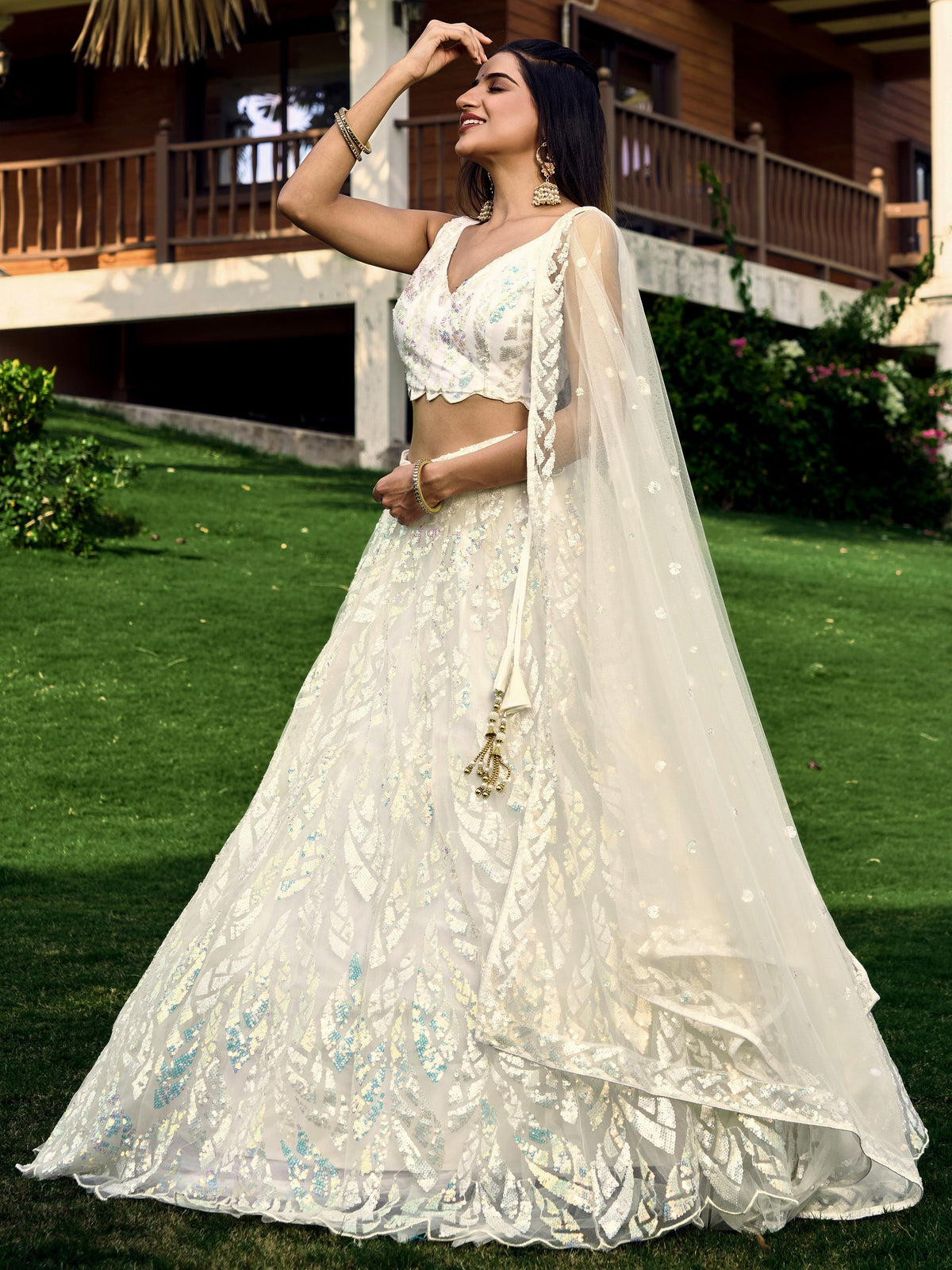 White breezy lehenga crafted with thread embroidery work - Joshindia