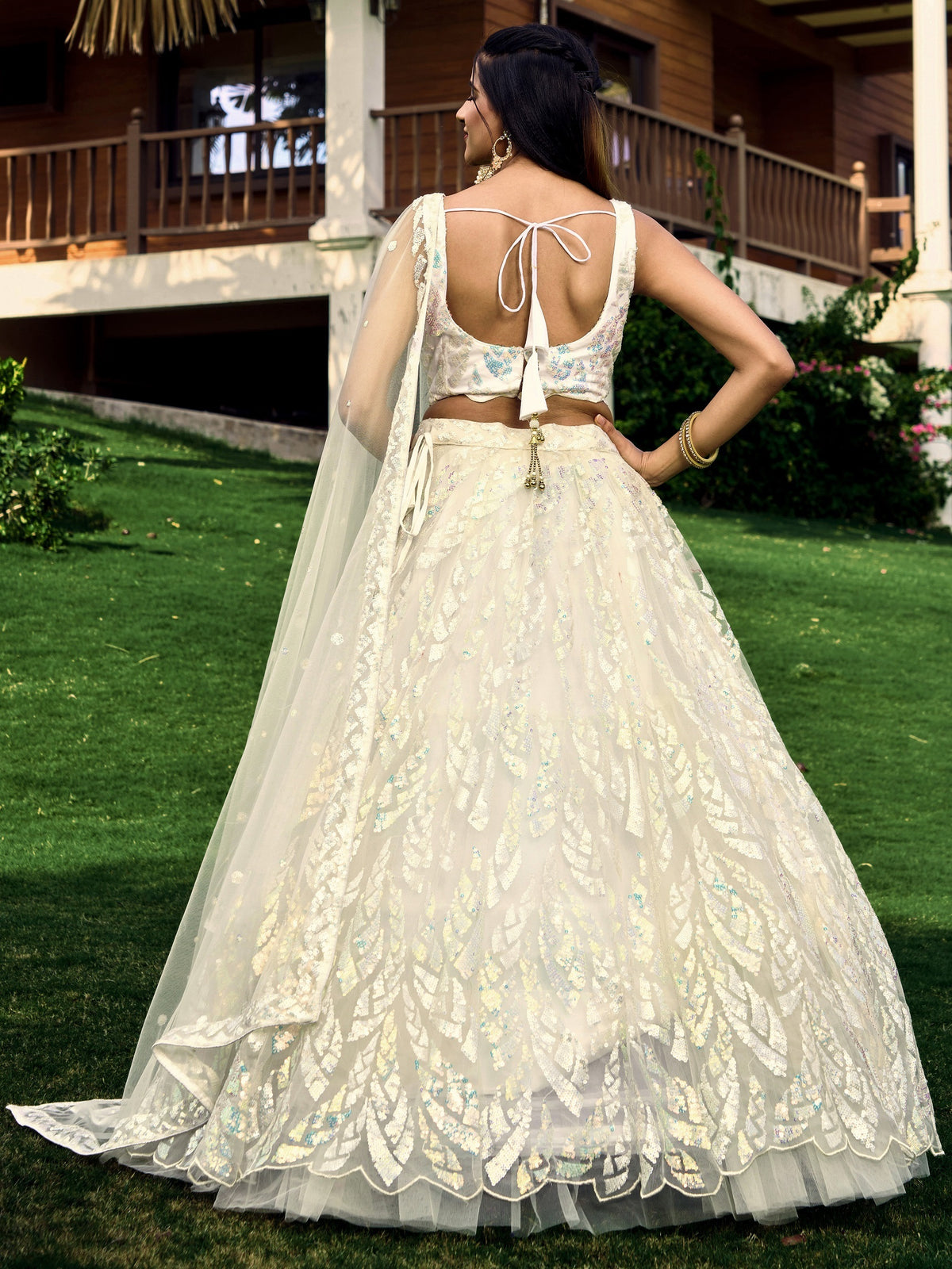 White breezy lehenga crafted with thread embroidery work - Joshindia