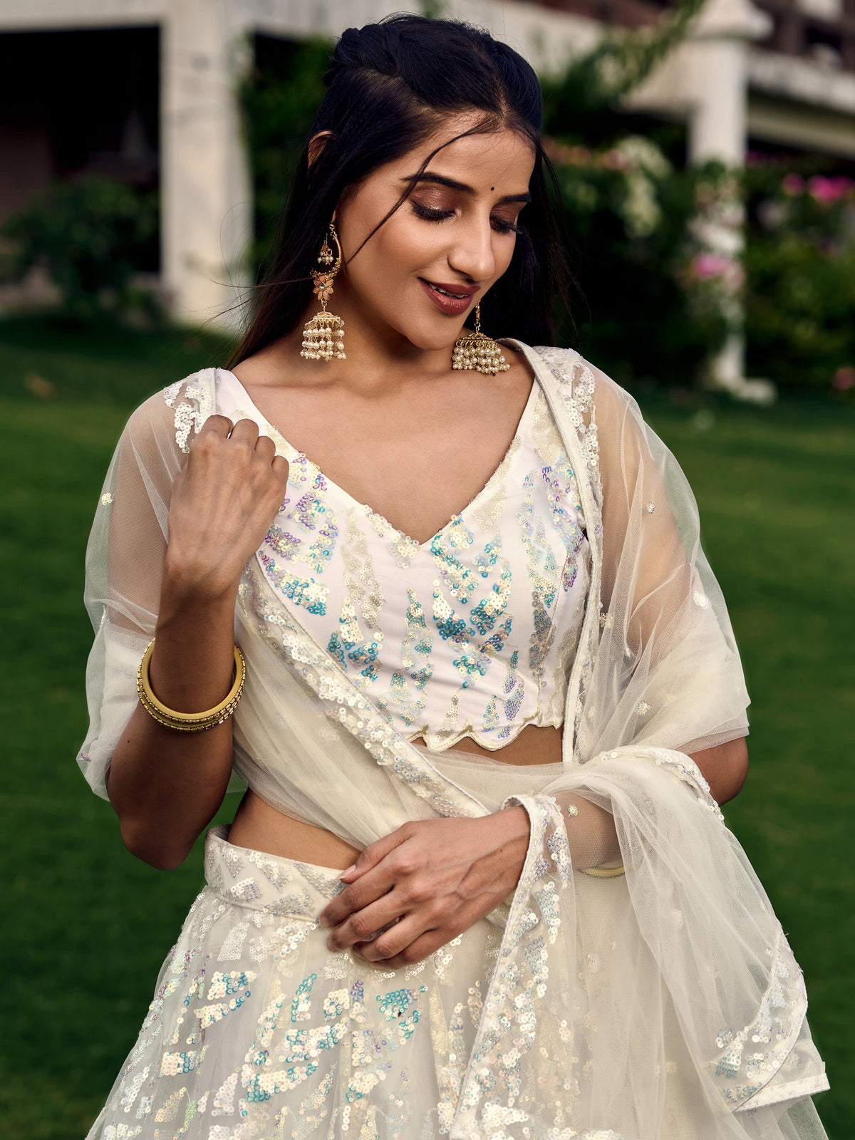 White breezy lehenga crafted with thread embroidery work - Joshindia
