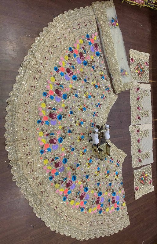 Off White Fox Georgette Sequins Embroidered Lehenga Choli