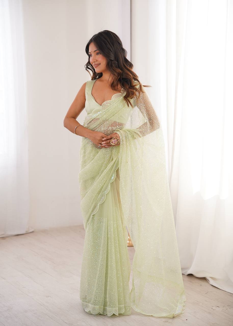 Pista Green And WhiteSequins Work Net Saree with Blouse Scalloped Border Party Wear