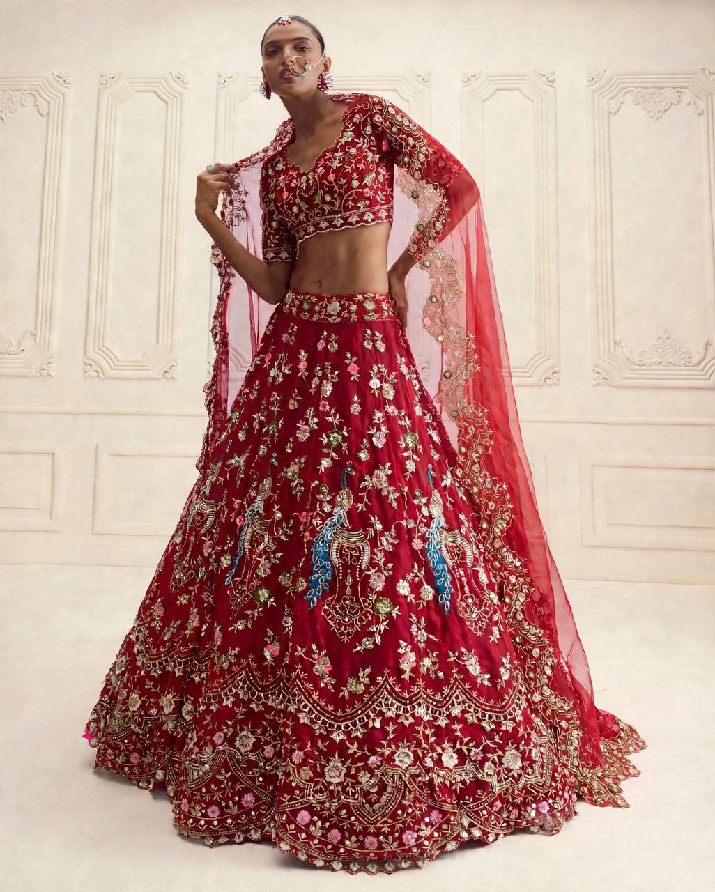 Sequins and zari floral embroidery detail on red lehenga