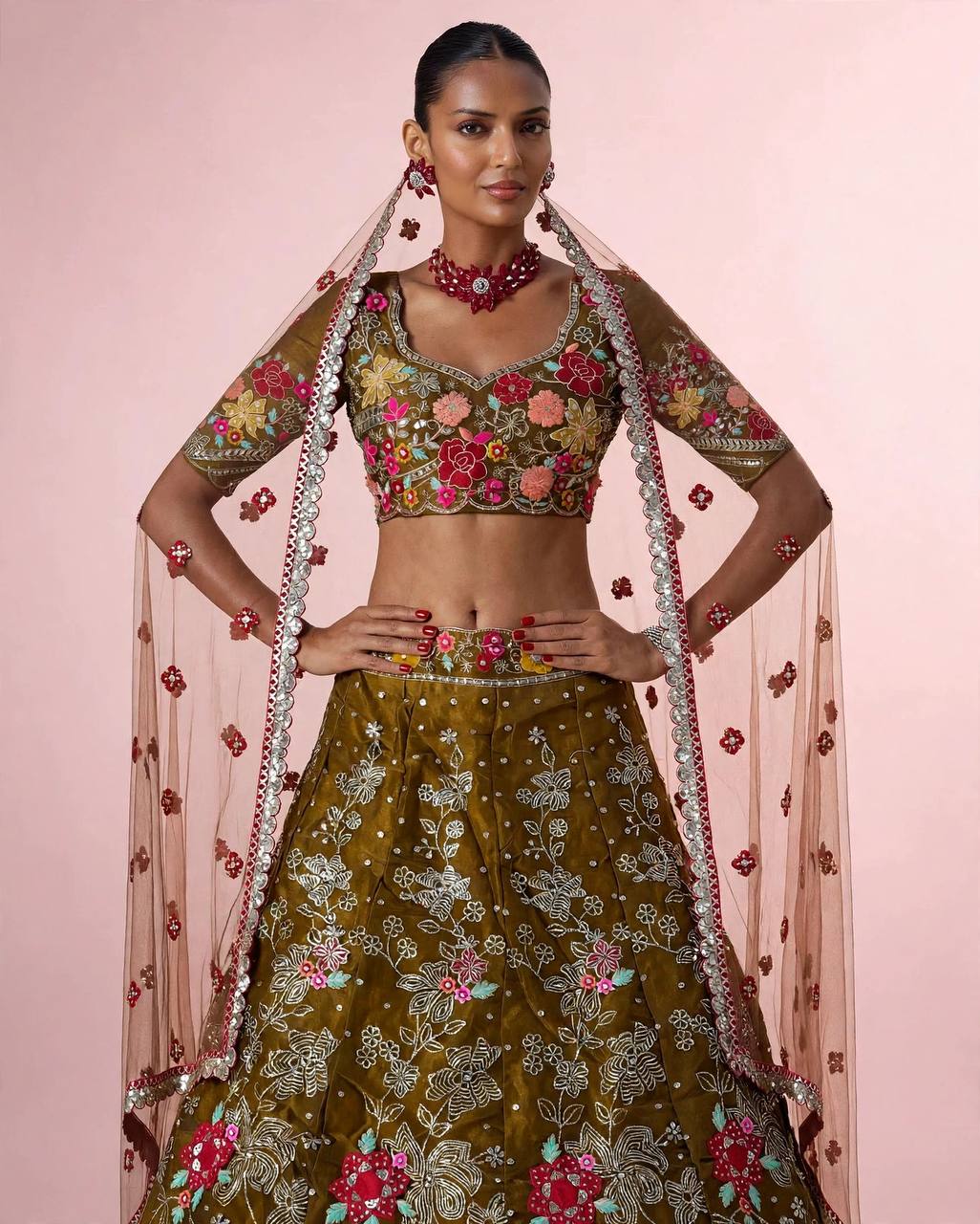Mehendi green embroidered lehenga choli side view with net dupatta