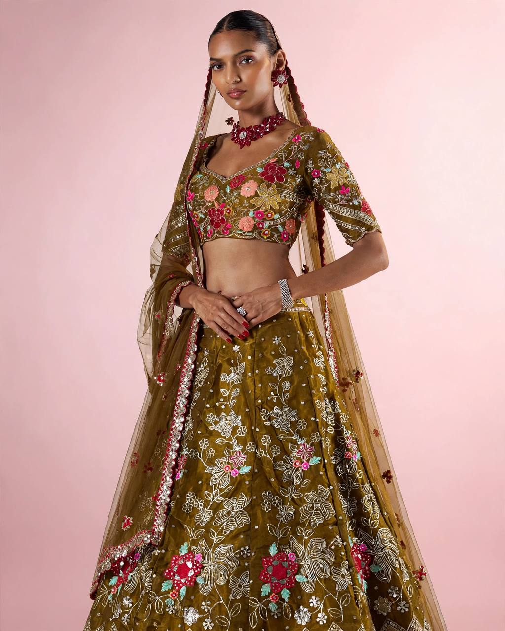 Olive green sequins embroidery lehenga full length back view