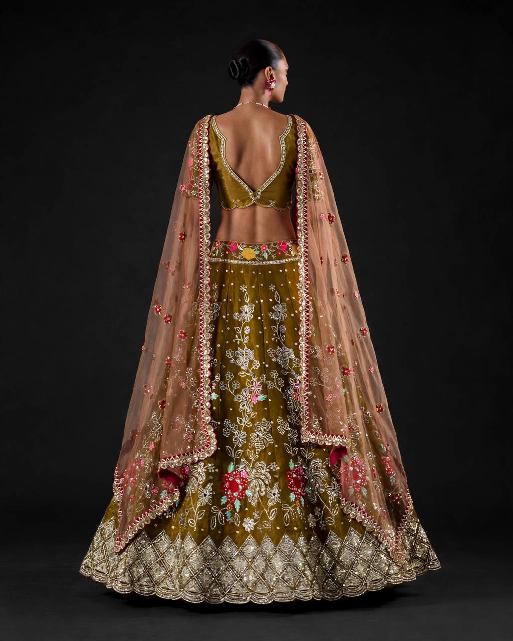 Jimmy Choo fabric lehenga choli with floral embroidery, three quarter pose