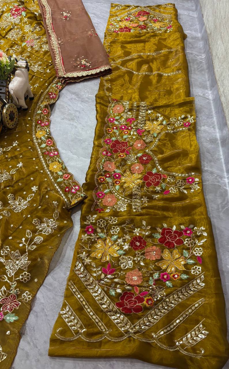 Olive green Jimmy Choo lehenga blouse front neck design with embroidery