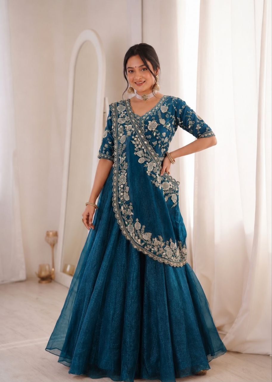 Elegant Rama Green Embroidered Crunshi Lehenga Choli