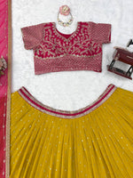 Pink & Yellow Faux Georgette Embroidered Lehenga Choli
