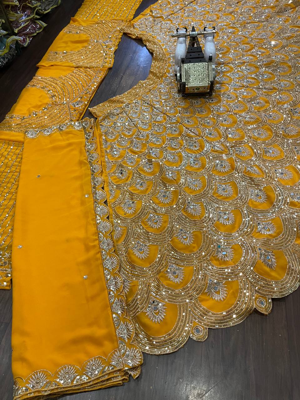 Yellow Faux Georgette Lehenga Choli with Mirror Work