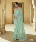 Amazing Green color Designer Georgette saree with blouse - Joshindia