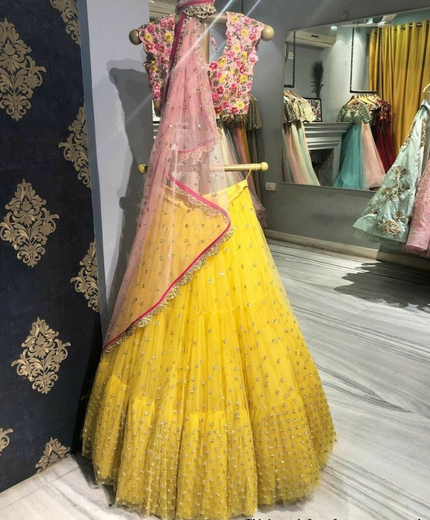 yellow color net designer lehnga choli - Joshindia