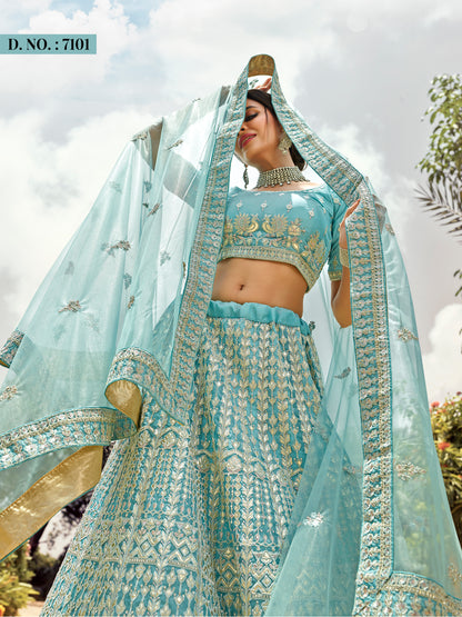 Turquoise color heavy designer lehenga for engagement and wedding