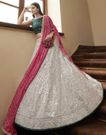 Trending white and green lehanga choli for festive look at affordable price - Joshindia
