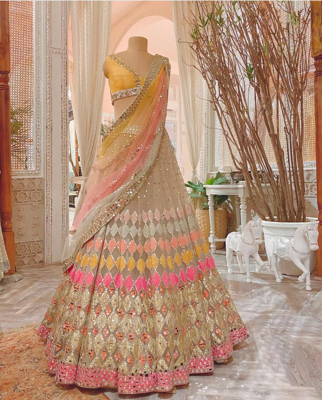 Trending yellow and pink color designer lehenga choli for stylish look buy now - Joshindia