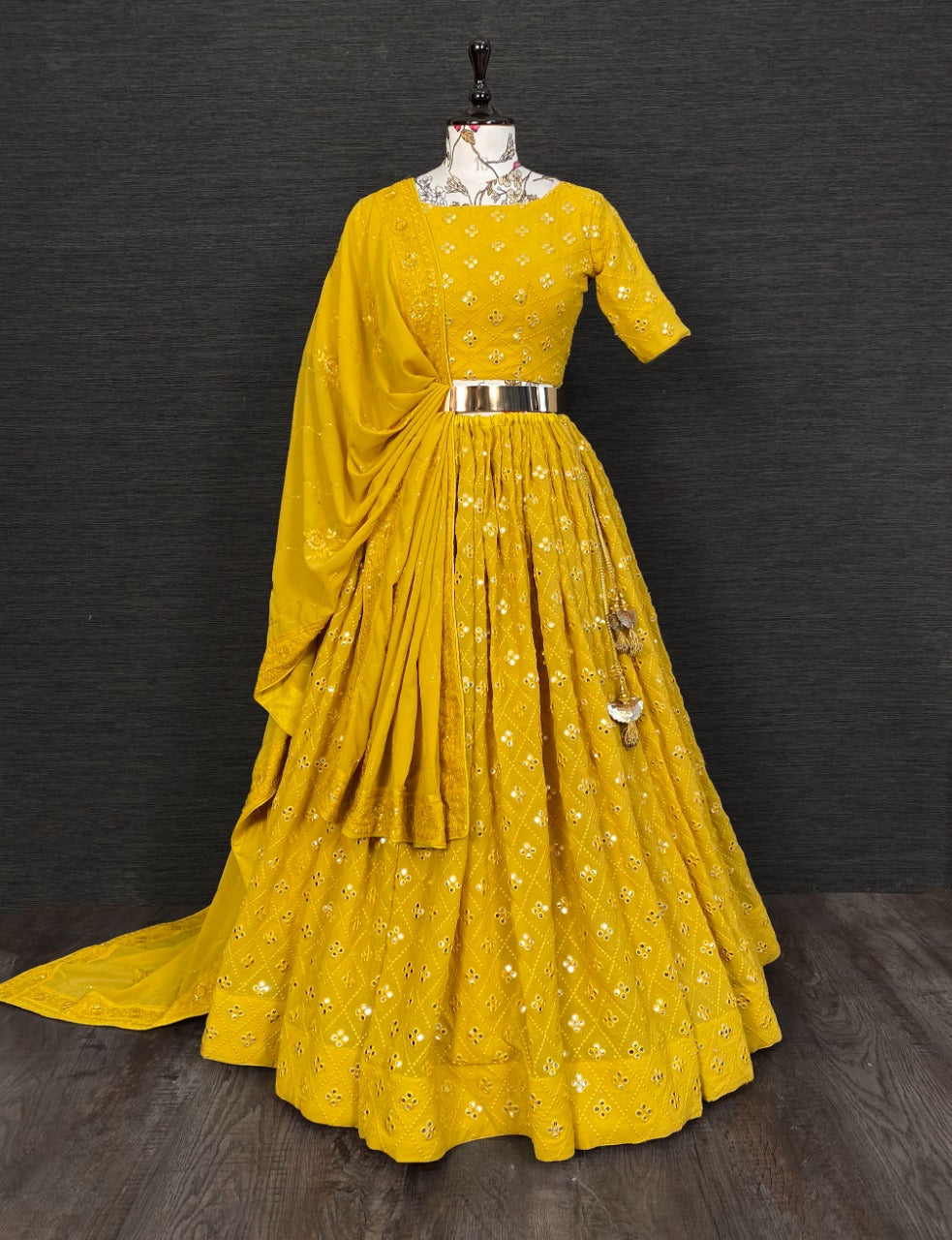 Beautiful yellow mirror work lehenga choli - Joshindia