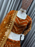 Orange color trendy designer lehenga choli for attractive looks - Joshindia