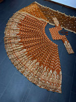 Orange color trendy designer lehenga choli for attractive looks - Joshindia