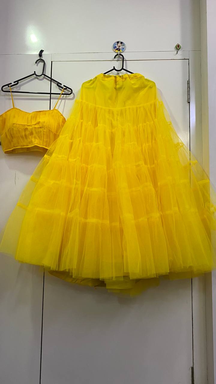 Yellow color designer ruffle lehenga choli - Joshindia