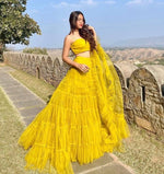 Yellow color designer ruffle lehenga choli - Joshindia