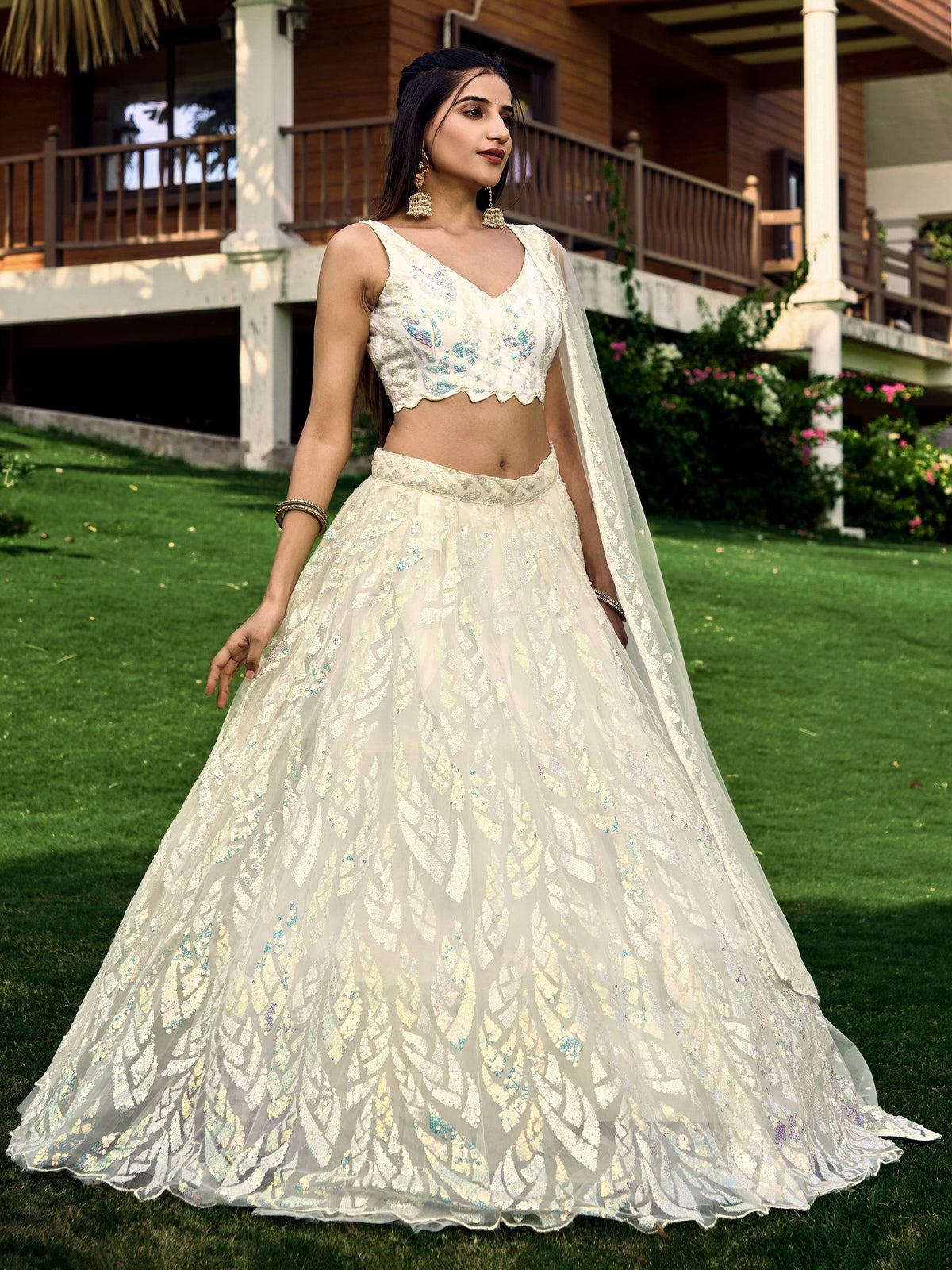 White breezy lehenga crafted with thread embroidery work - Joshindia