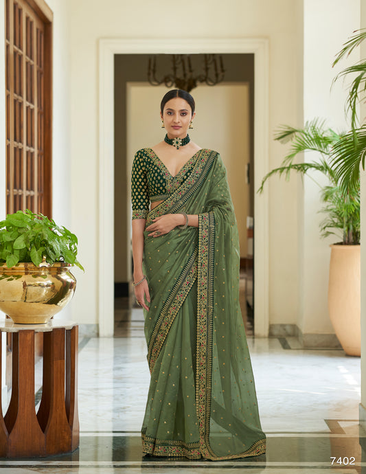 Embellished Olive green two tone vichitra silk saree