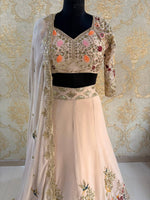 Cream Faux Georgette Lehenga Choli with Sequins Embroidery Party Wear Lehenga