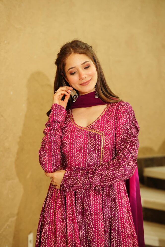 Soft Butterfly Netted Dark Pink Designer Gown With Heavy Embroidery Worked  – Kaleendi