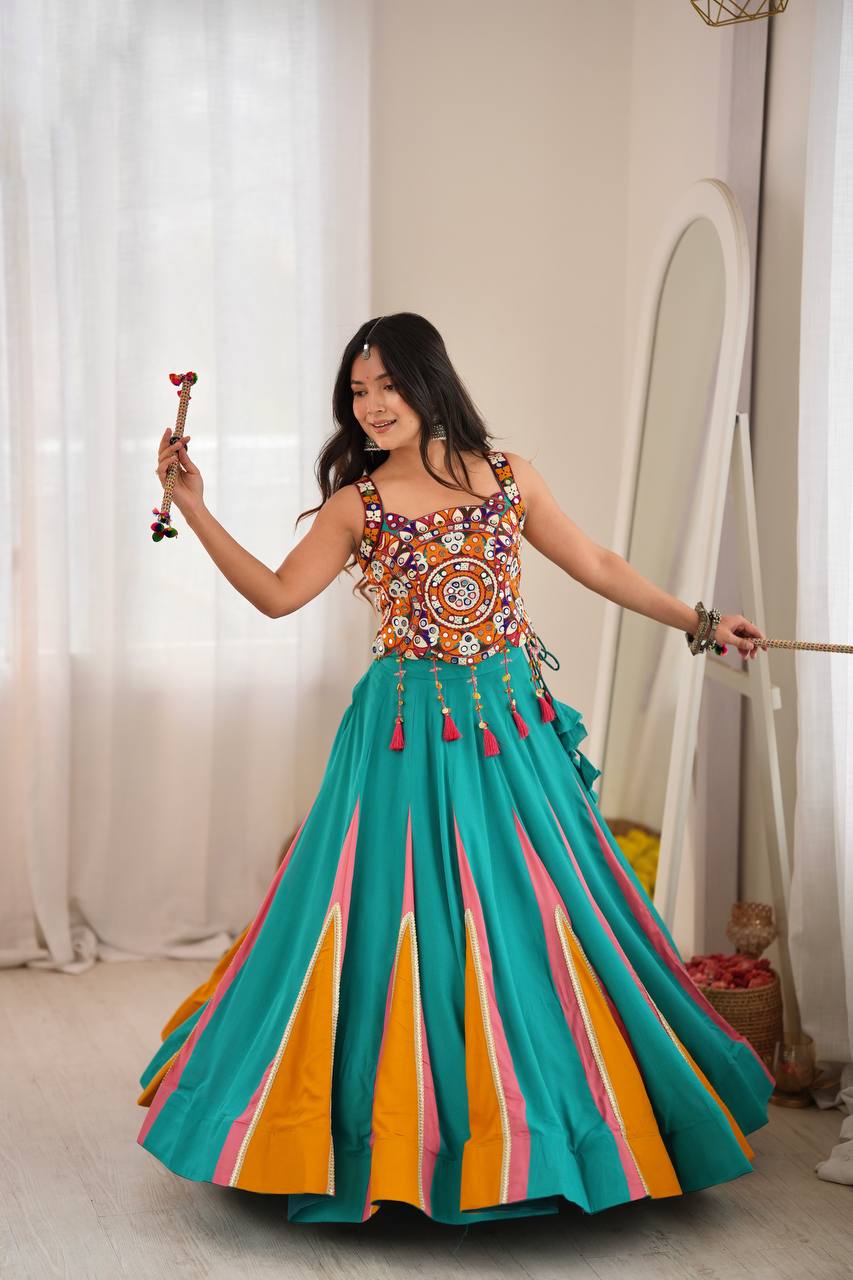 Navratri Heavy Rayon Lehenga Choli with Fancy Lagdi Patta Lace &amp; Mirror Work