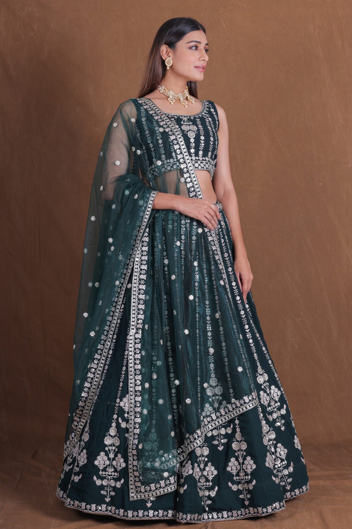 Bottle Green Georgette Lehenga Choli Silver Zari Sequins Work Net Dupatta Wedding