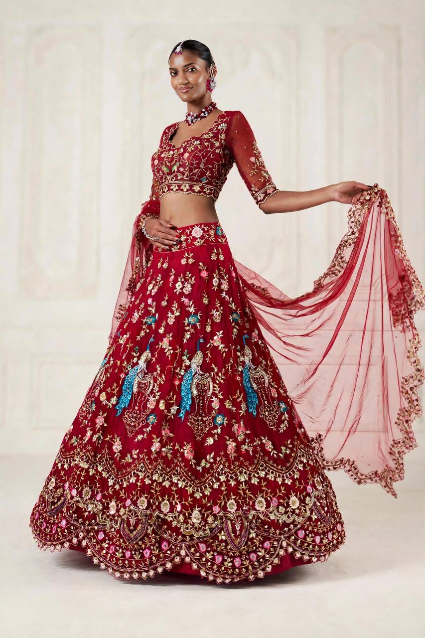 Red lehenga lower border cut work embroidery close up