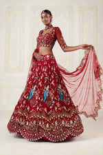 Red lehenga lower border cut work embroidery close up