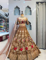 Semi-stitched olive green lehenga with can-can and canvas patta layers