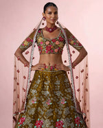 Mehendi green embroidered lehenga choli side view with net dupatta