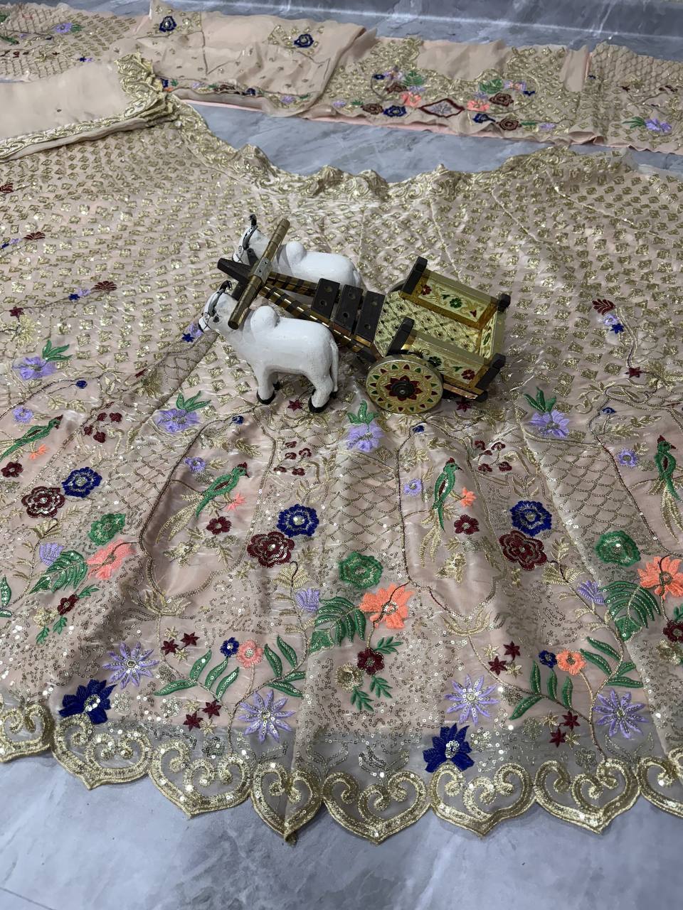 Elegant Cream Sequins Embroidered Lehenga Choli