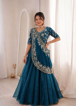 Elegant Rama Green Embroidered Crunshi Lehenga Choli