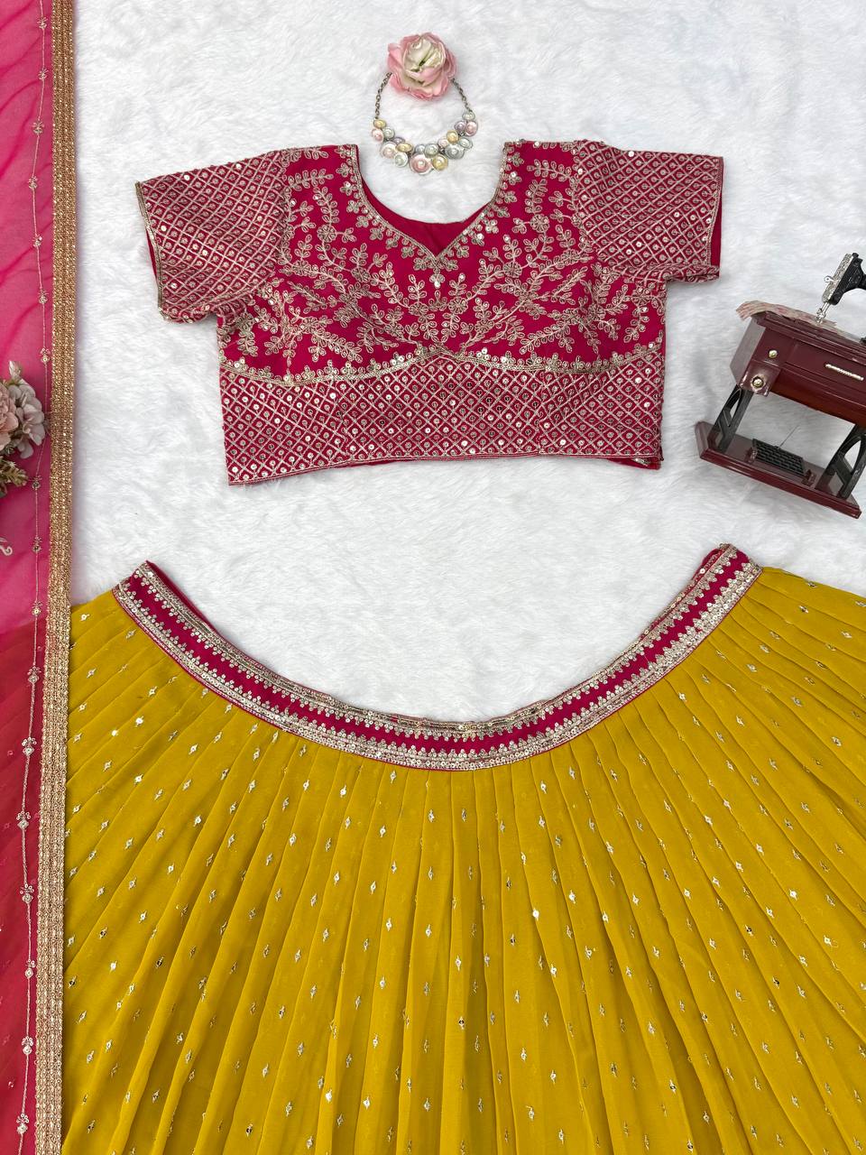 Pink & Yellow Faux Georgette Embroidered Lehenga Choli