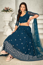 Stunning Rama Green Embroidered Georgette Lehenga Choli