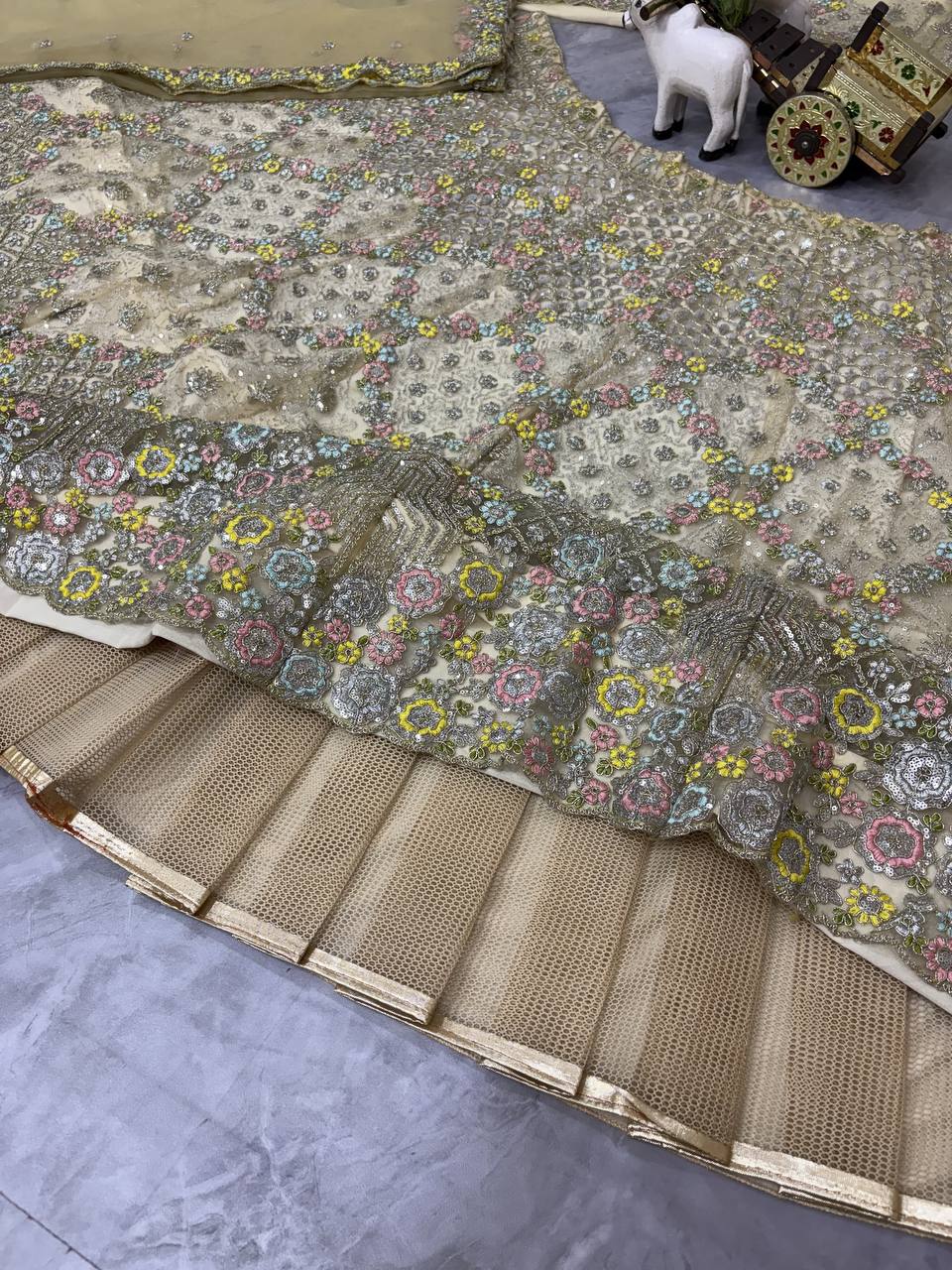 Elegant Cream Sequins EmbroideredLehenga Choli