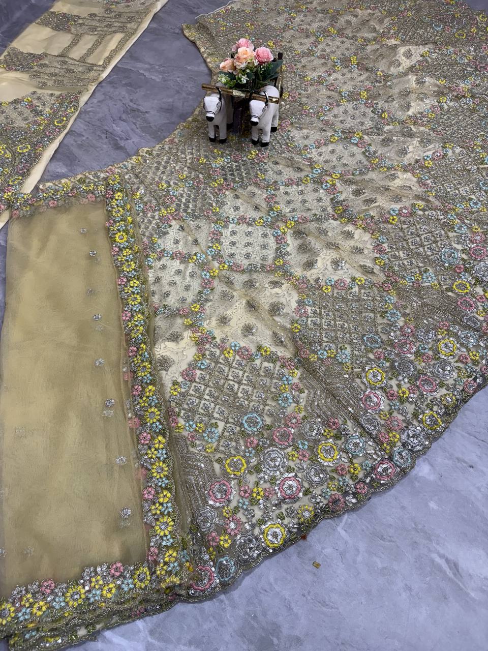 Elegant Cream Sequins EmbroideredLehenga Choli