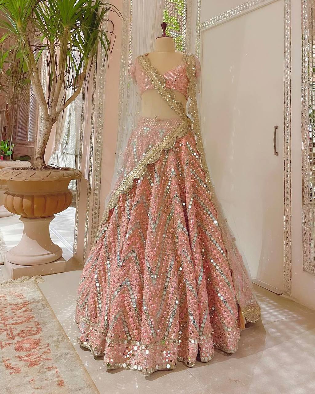 Peach Sequins Embroidered Soft Net Lehenga Choli