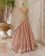 Peach Sequins Embroidered Soft Net Lehenga Choli