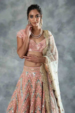 Peach Sequins Embroidered Soft Net Lehenga Choli