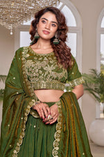 Green Color Pure Embroidered Lehenga Choli