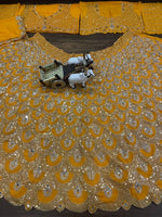 Yellow Faux Georgette Lehenga Choli with Mirror Work