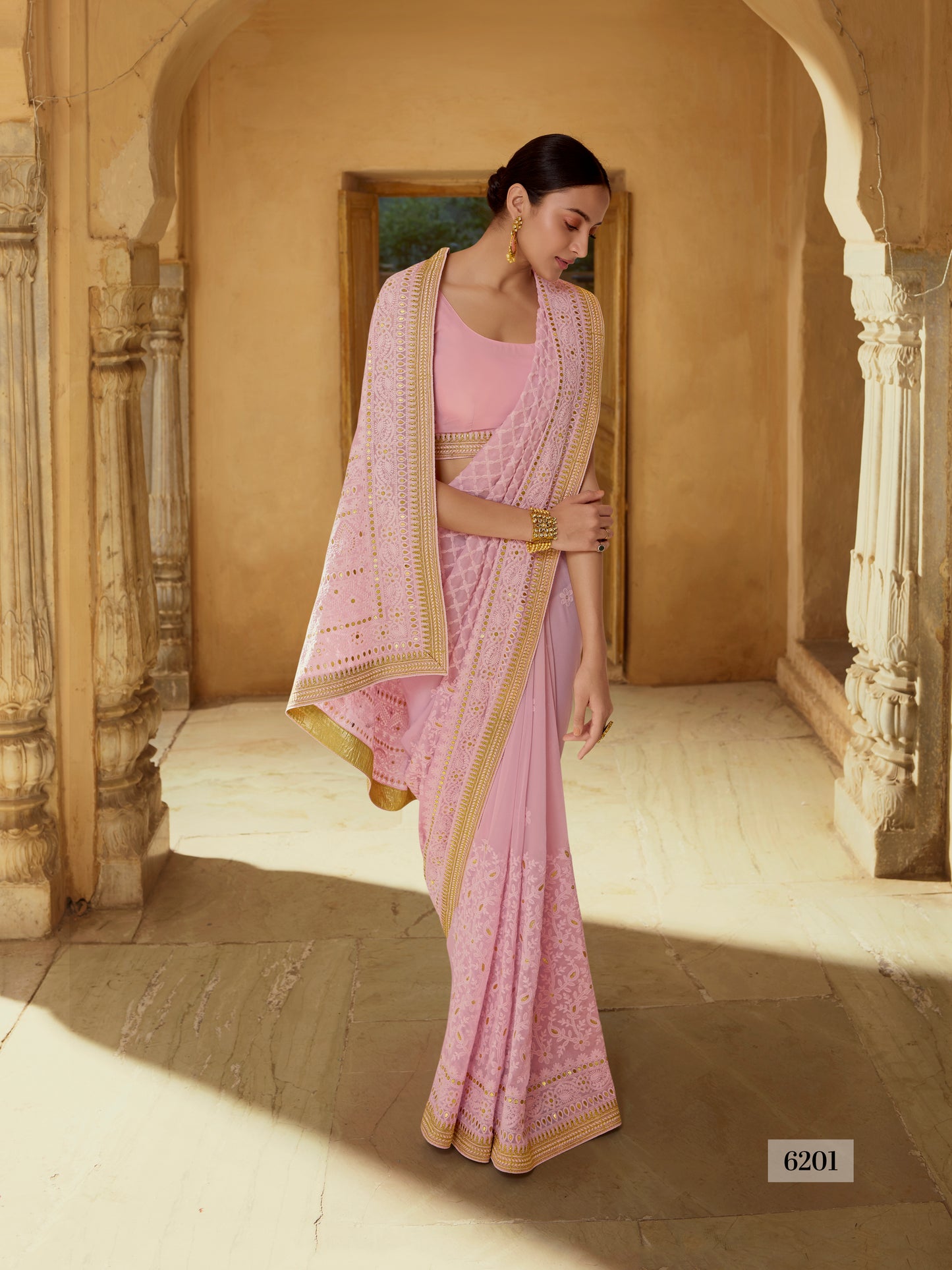 Amazing Pink color Designer Georgette saree with blouse