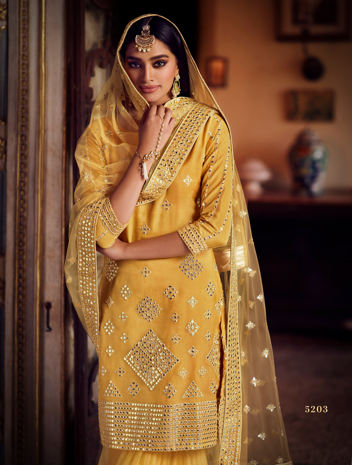Attractive yellow color mirror work sharara suit for haldi function - Joshindia