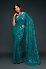 Sea green color designer sequins saree for wedding and reception - Joshindia