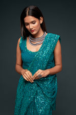 Sea green color designer sequins saree for wedding and reception - Joshindia