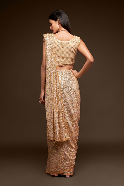 Golden designer sequin saree for wedding and reception